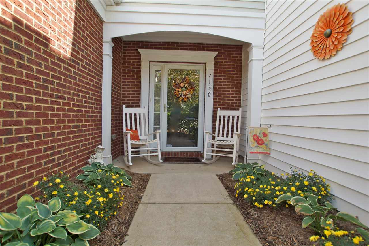 7140 Racine Way Raleigh, NC 27615 - Photo 2 of 29 Perfect for sitting and reading your favorite book Covered front porch