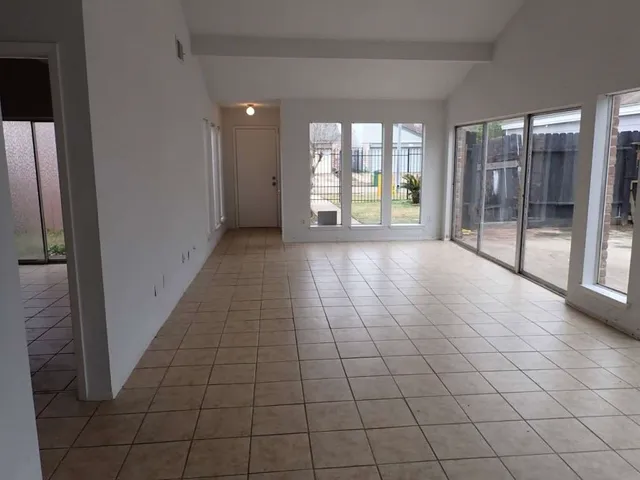 a view of an empty room and window