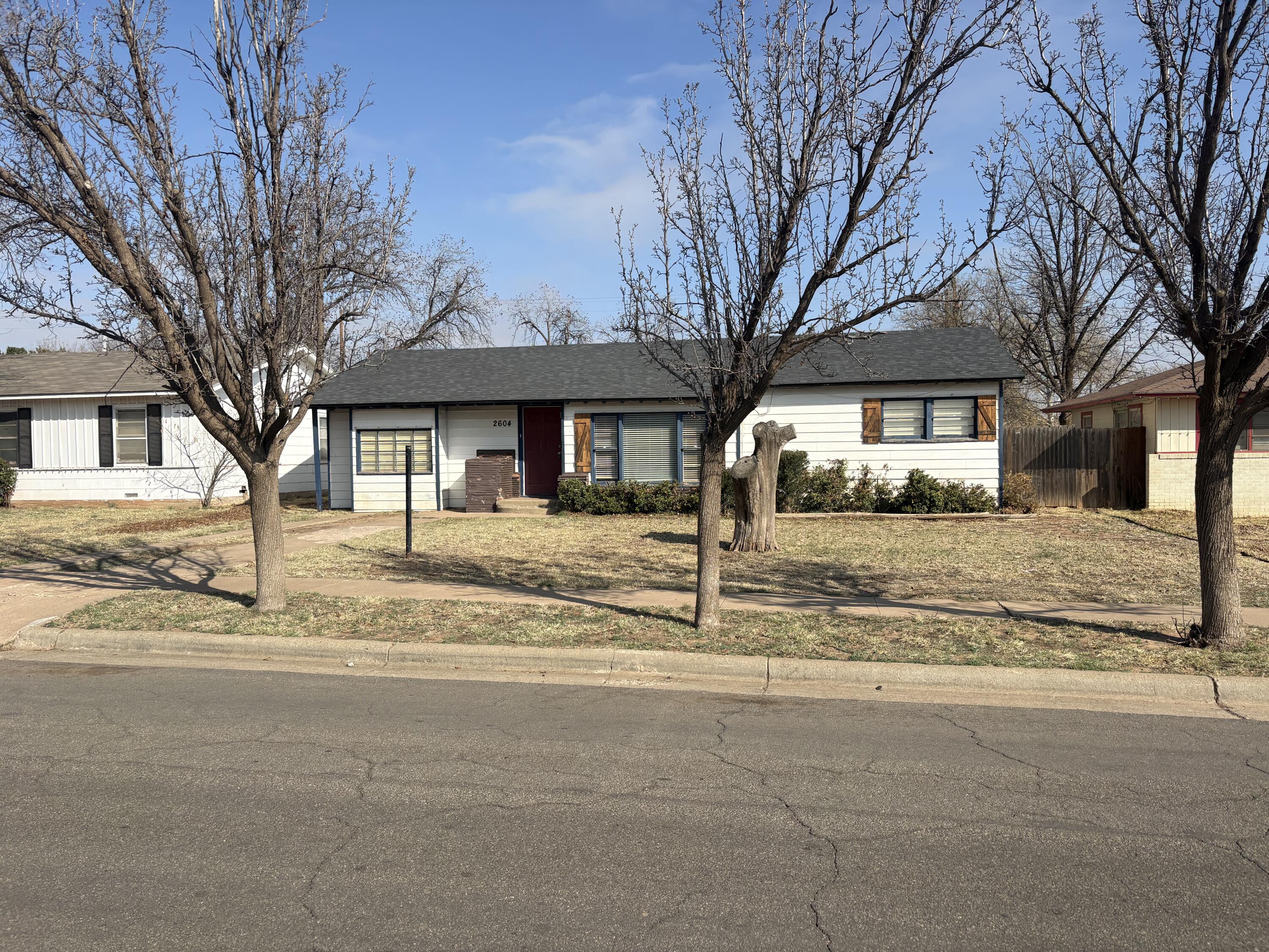 2506 44th Street Lubbock, TX 79413 - Photo 1 of 1 a front view of a house with a yard