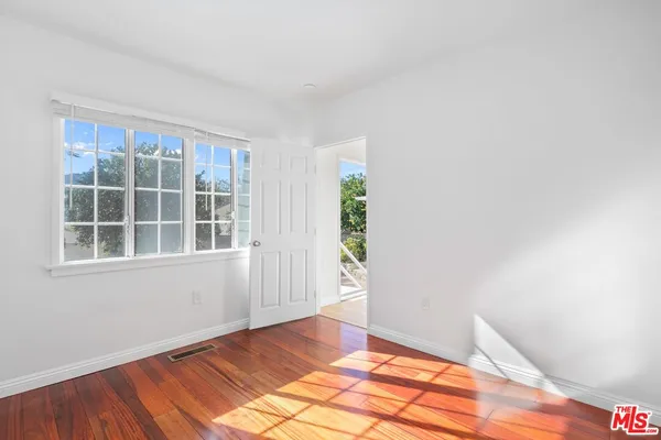 a view of an empty room and window