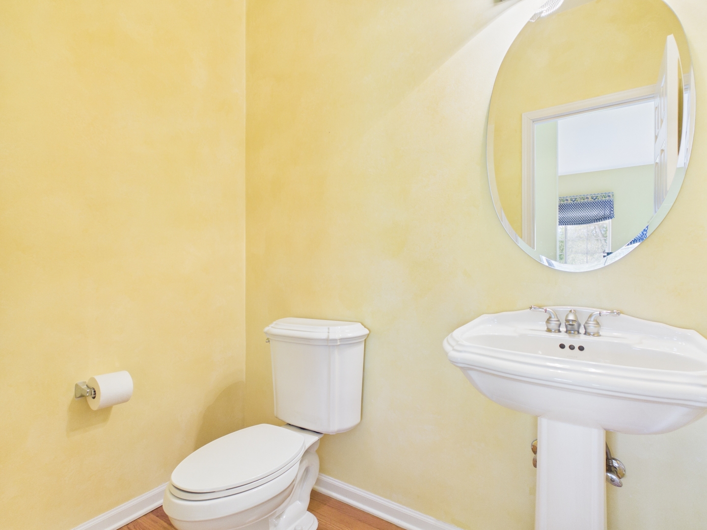 7486 Abbey Road Gurnee, IL 60031 - Photo 15 of 35 a bathroom with a sink mirror and toilet