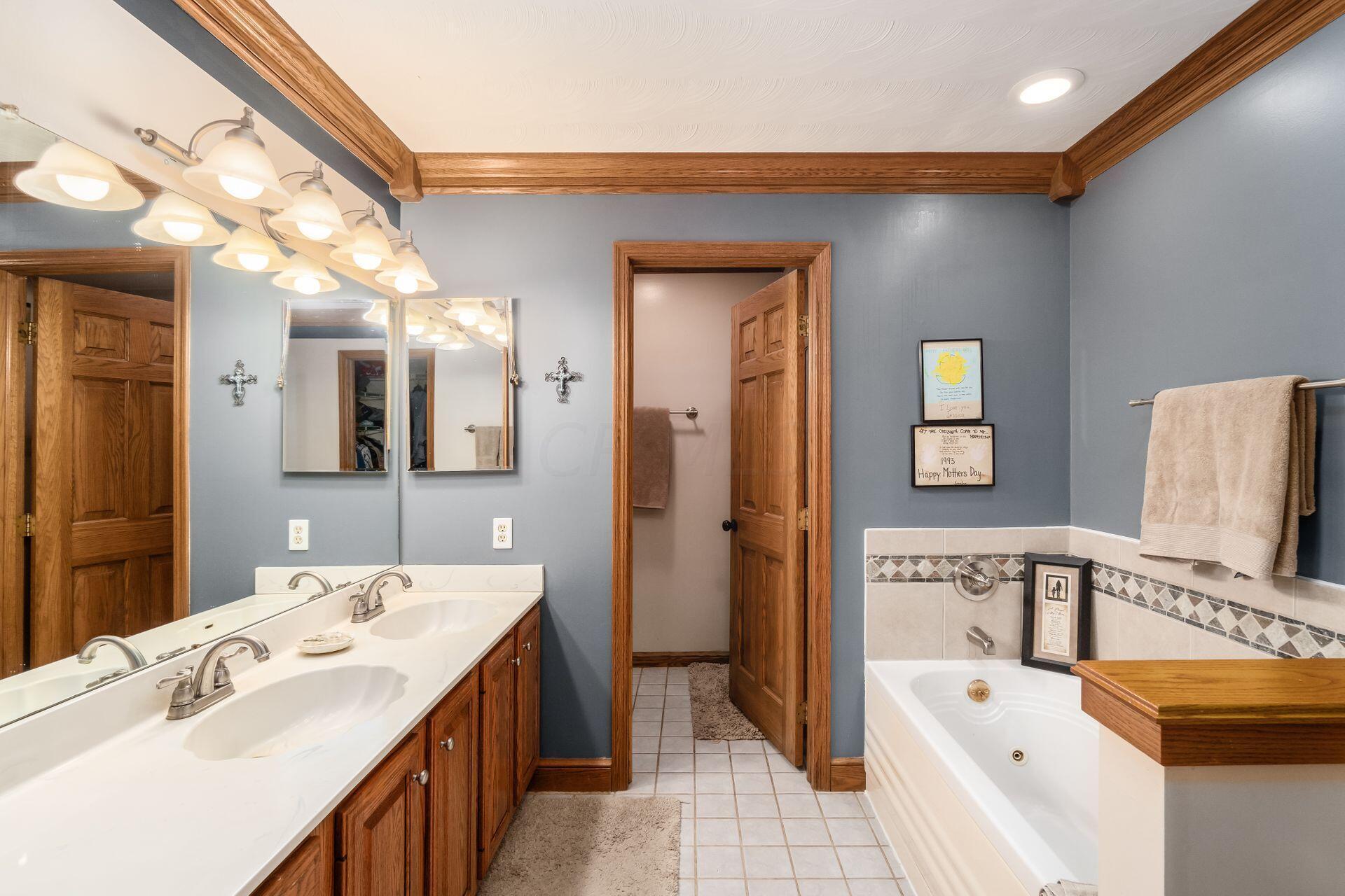 10761 Tollgate Road Southwest Etna, OH 43062 - Photo 47 of 90 Jetted Tub - Private Water Closet & Tiled Walk-in Shower - Crown Molding.