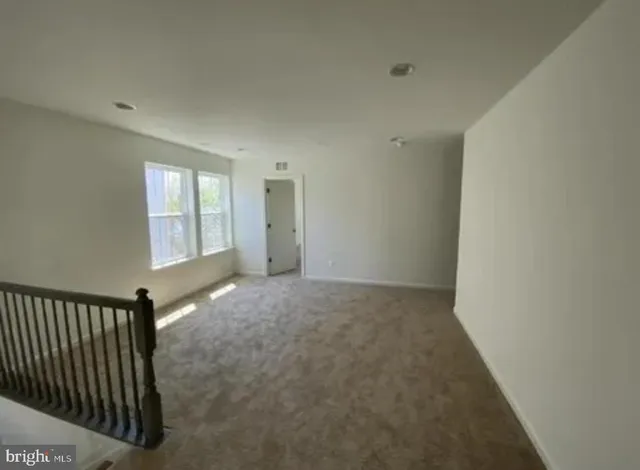 a view of entryway with stairs