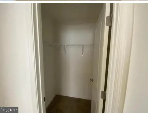 a view of hallway with windows