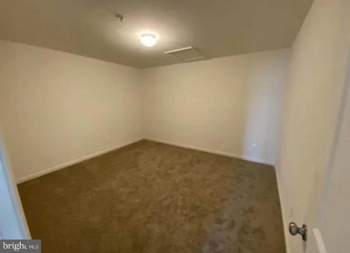 116 Trails Way Joppa, MD 21085 - Photo 28 of 45 an empty room with a bench