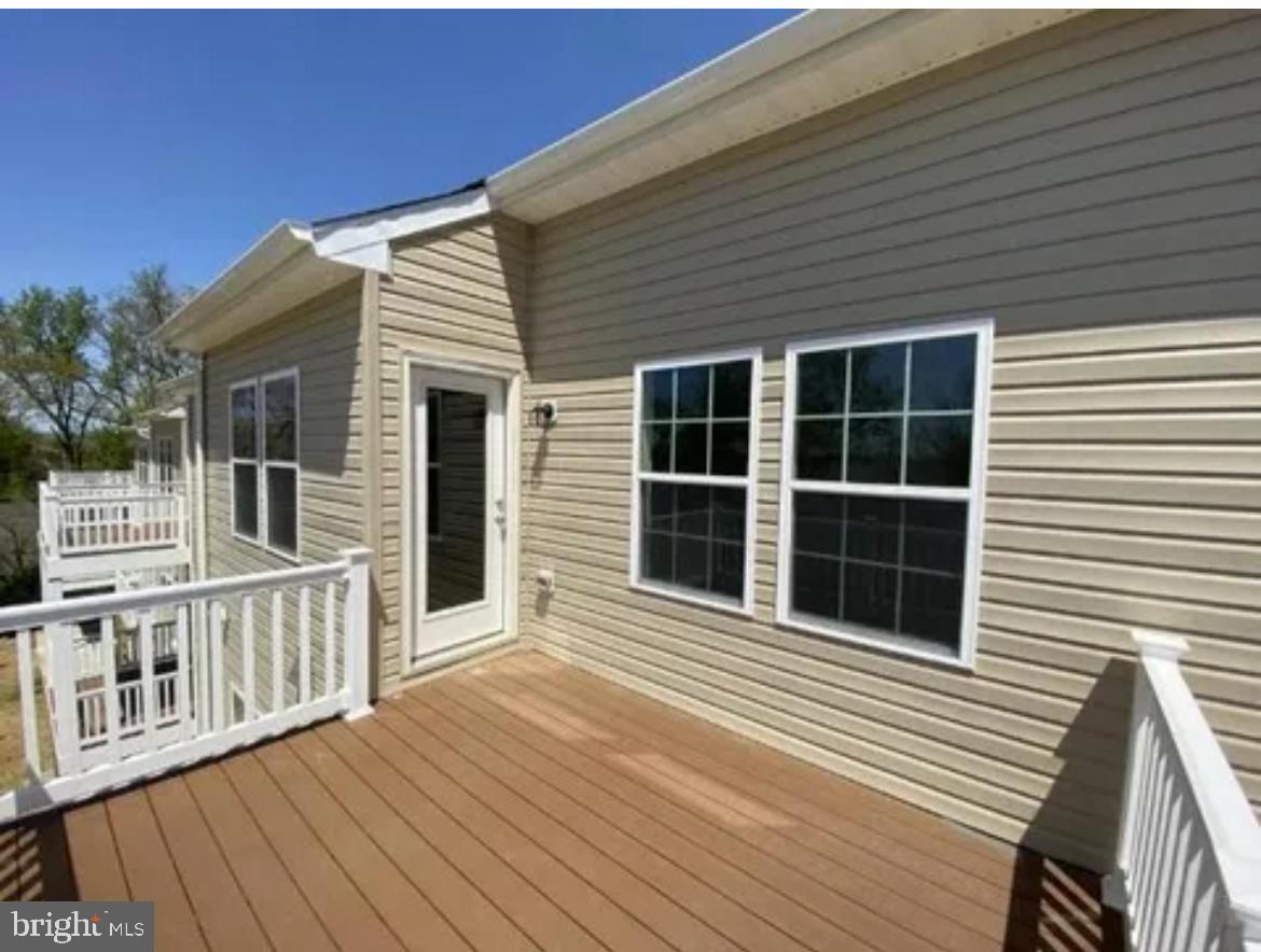 116 Trails Way Joppa, MD 21085 - Photo 34 of 45 a view of a house with wooden deck