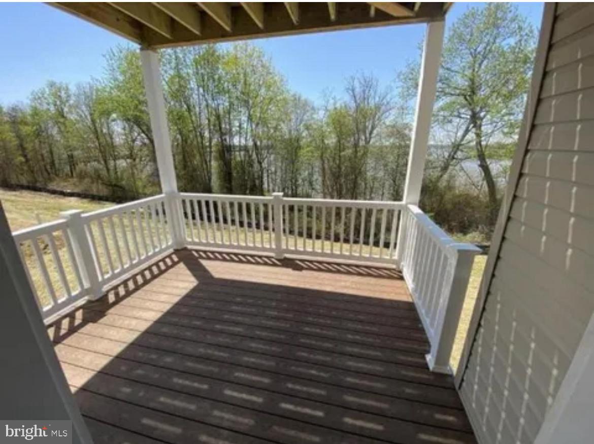 116 Trails Way Joppa, MD 21085 - Photo 36 of 45 a view of balcony with wooden floor and fence