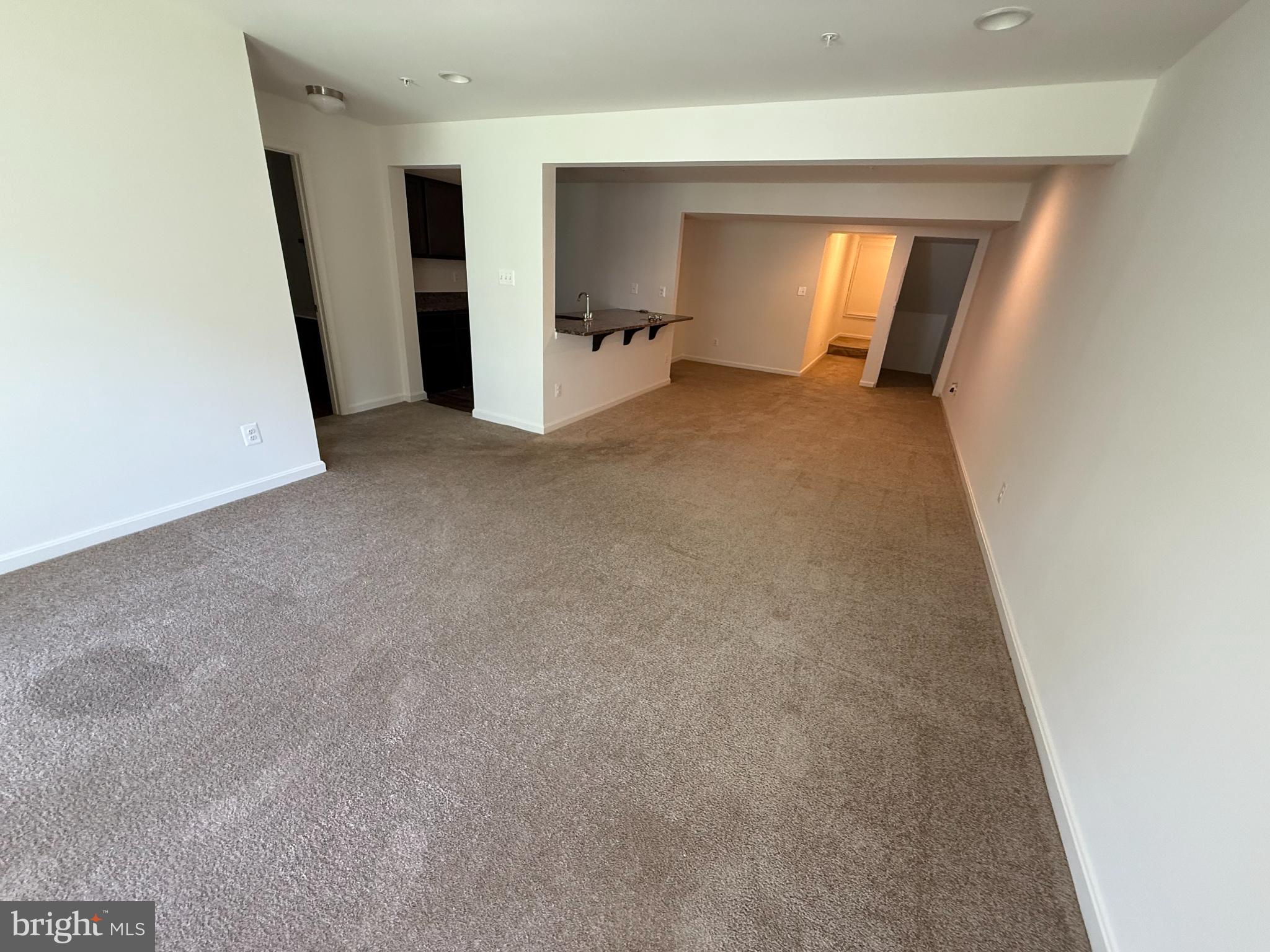116 Trails Way Joppa, MD 21085 - Photo 45 of 45 an empty room with a fireplace and a window