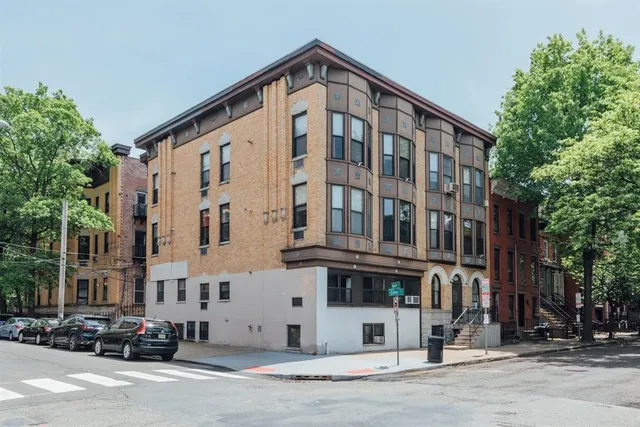 a front view of a building with street
