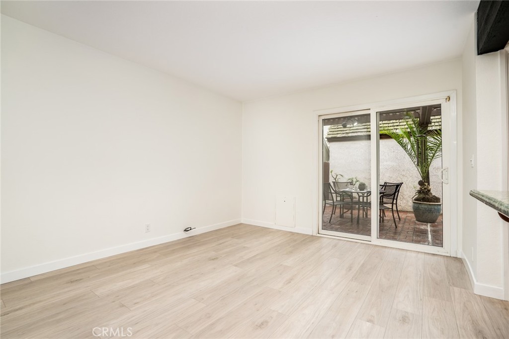 2007 Delaware Street Huntington Beach, CA 92648 - Photo 16 of 36 This family room is adjacent to the kitchen and has direct access to the patio and garage!