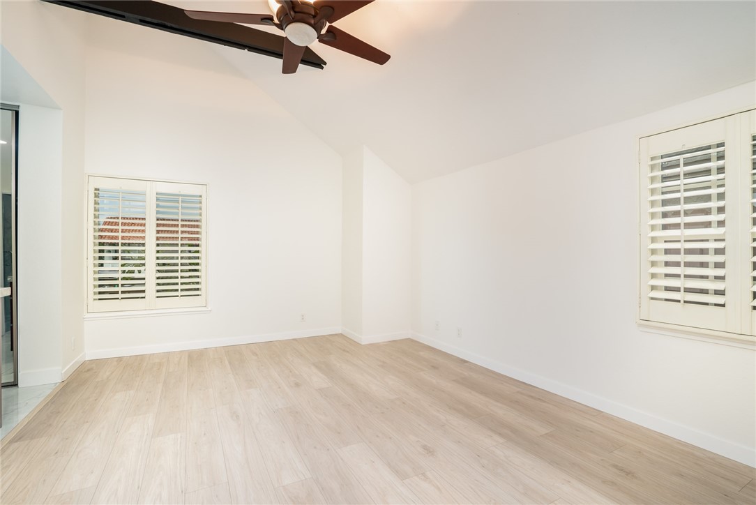 2007 Delaware Street Huntington Beach, CA 92648 - Photo 18 of 36 Downstairs Primary Bedroom w/vaulted & beamed ceilings!