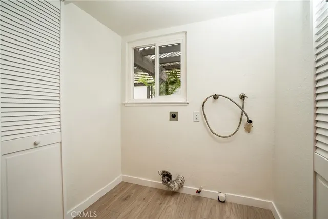 a bathroom with a sink and a window