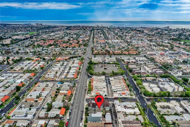 an aerial view of residential building and parking space