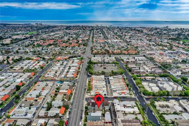 an aerial view of residential building and parking space
