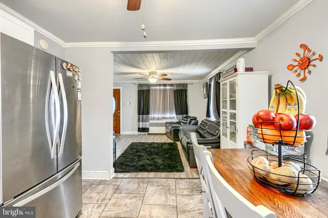 a view of a living room and dining room