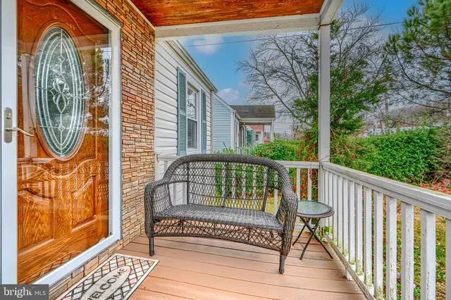a view of a bench on the roof deck
