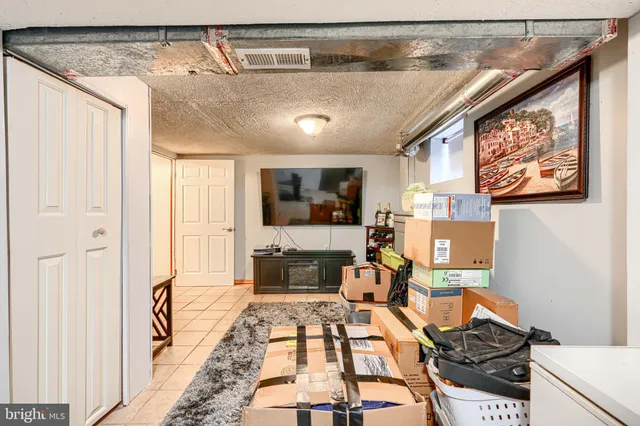 a kitchen with stainless steel appliances granite countertop a refrigerator and cabinets