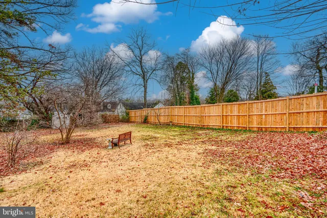 a view of a house with a snow in the yard