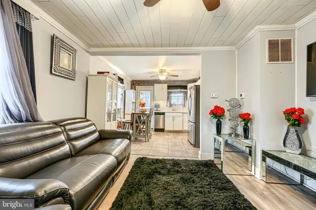 a living room with furniture and a couch