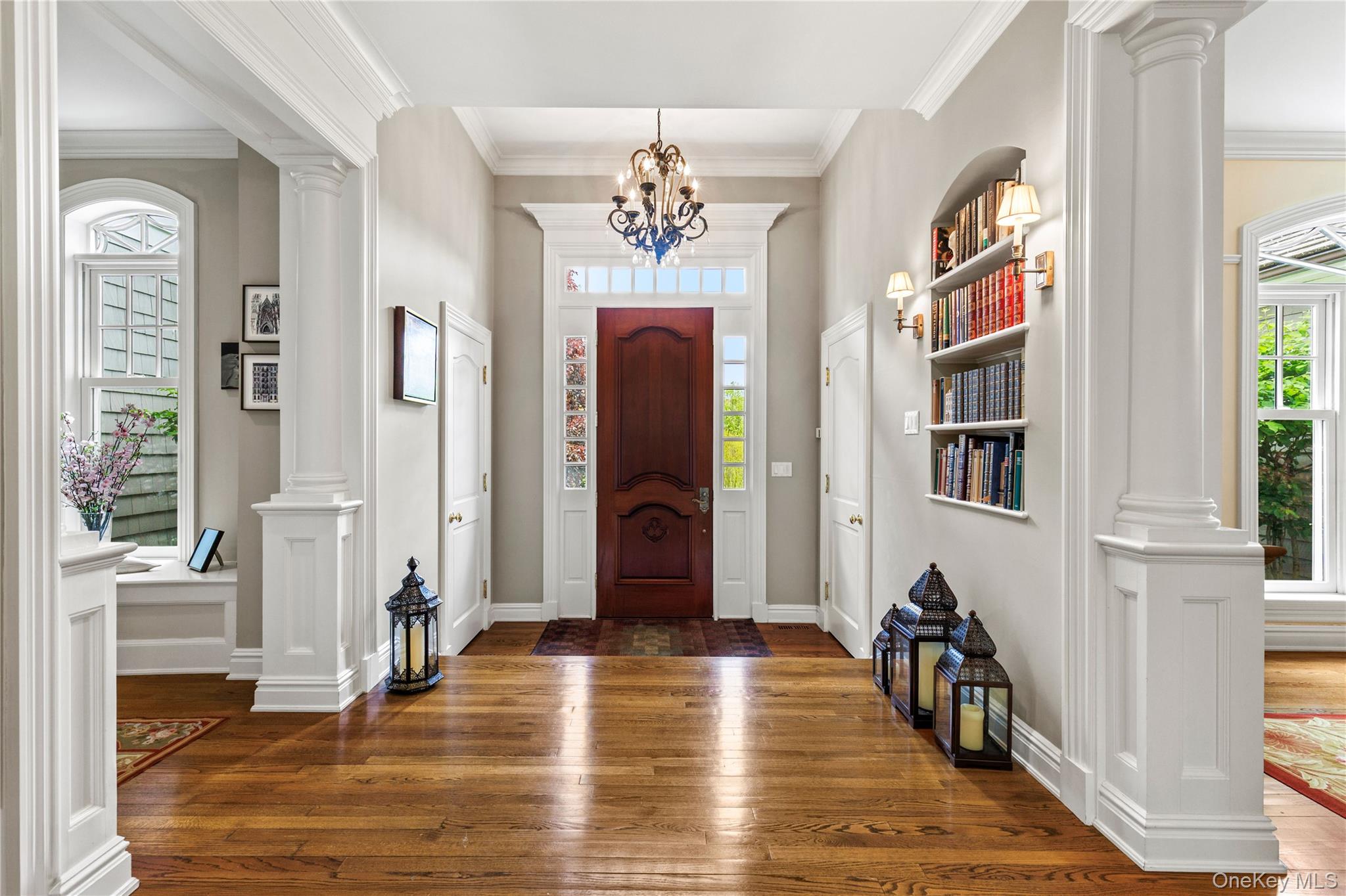 63 Old Mill River Road Pound Ridge, NY 10576 - Photo 4 of 47 a view of a hallway with wooden floor and windows