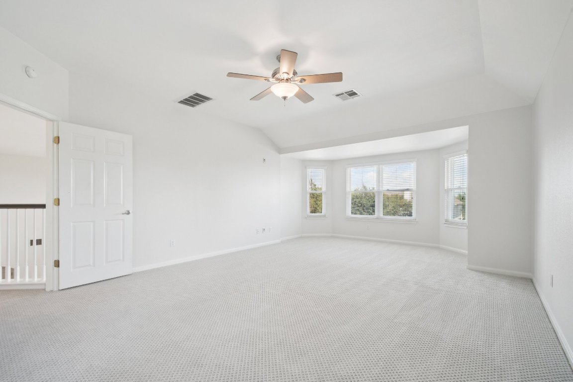12421 Gun Metal Drive Austin, TX 78739 - Photo 22 of 40 a view of an empty room with a window