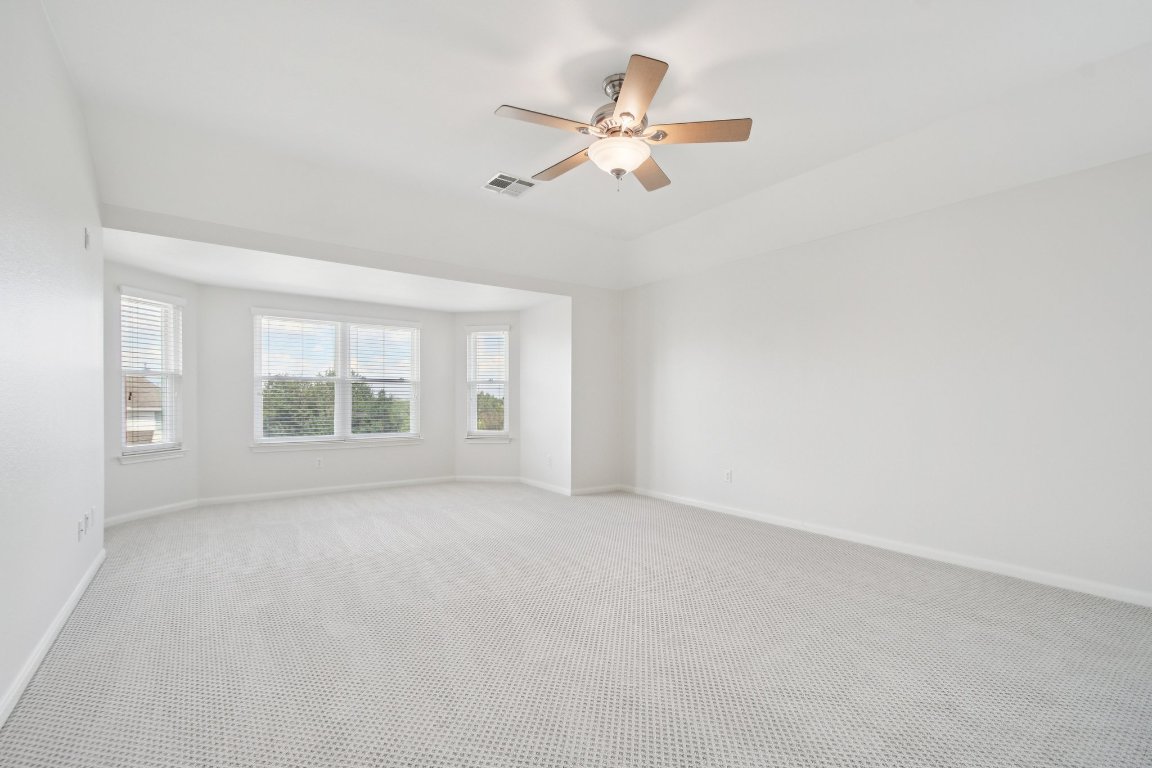 12421 Gun Metal Drive Austin, TX 78739 - Photo 23 of 40 a view of an empty room with a window