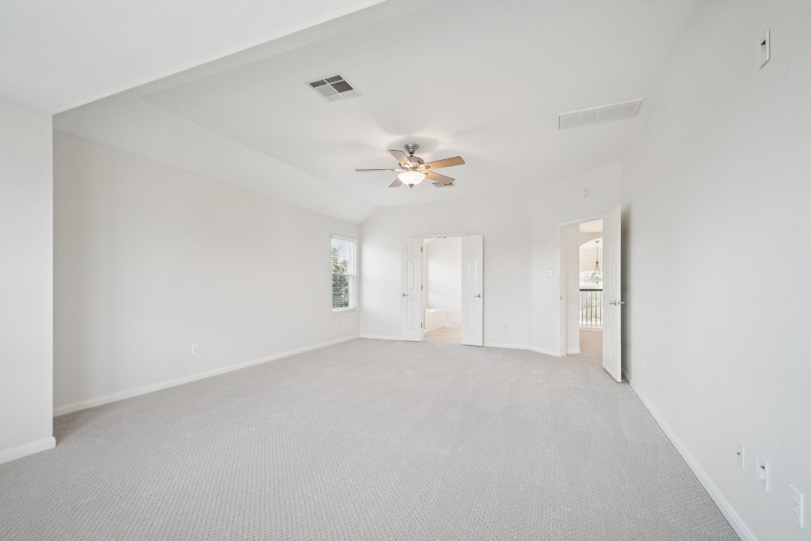 12421 Gun Metal Drive Austin, TX 78739 - Photo 24 of 40 a view of an empty room with a window