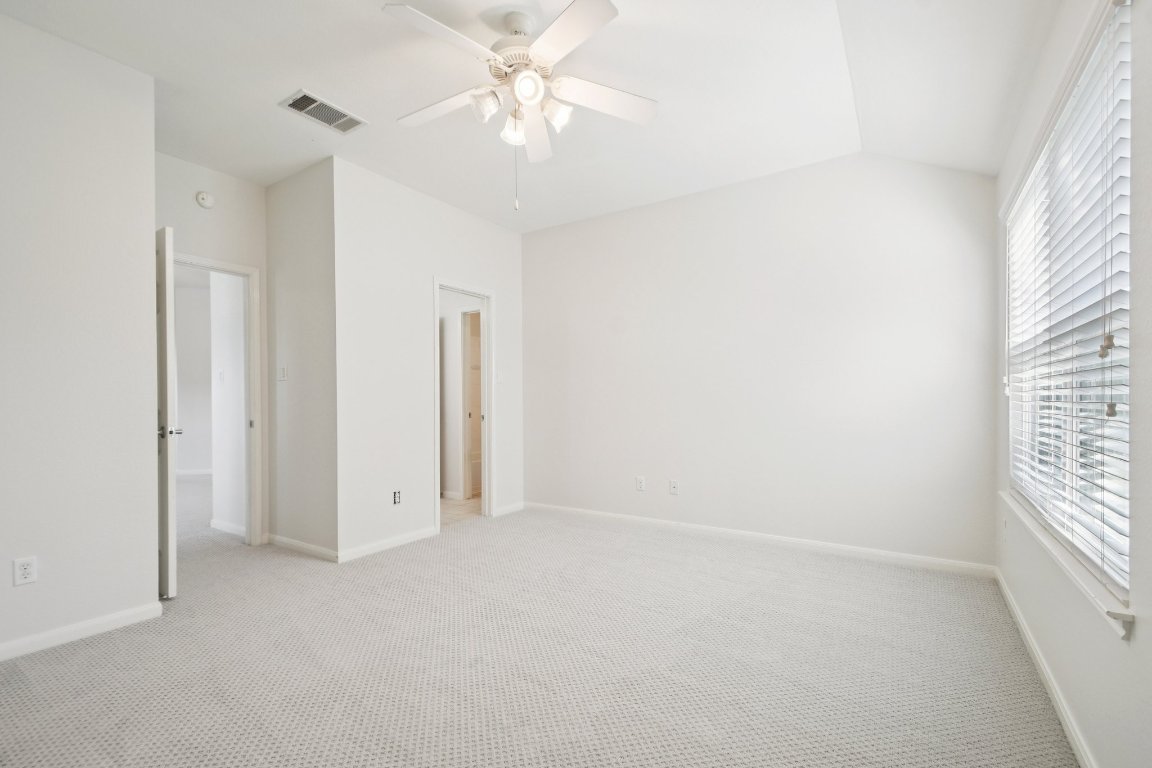 12421 Gun Metal Drive Austin, TX 78739 - Photo 32 of 40 wooden floor in an empty room with a window