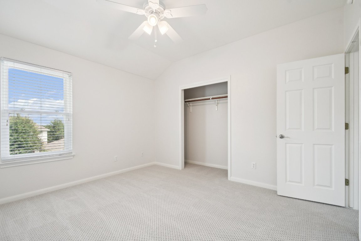 12421 Gun Metal Drive Austin, TX 78739 - Photo 34 of 40 a view of an empty room with a window