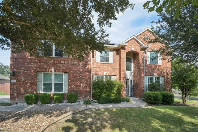 a view of swimming pool with outdoor seating