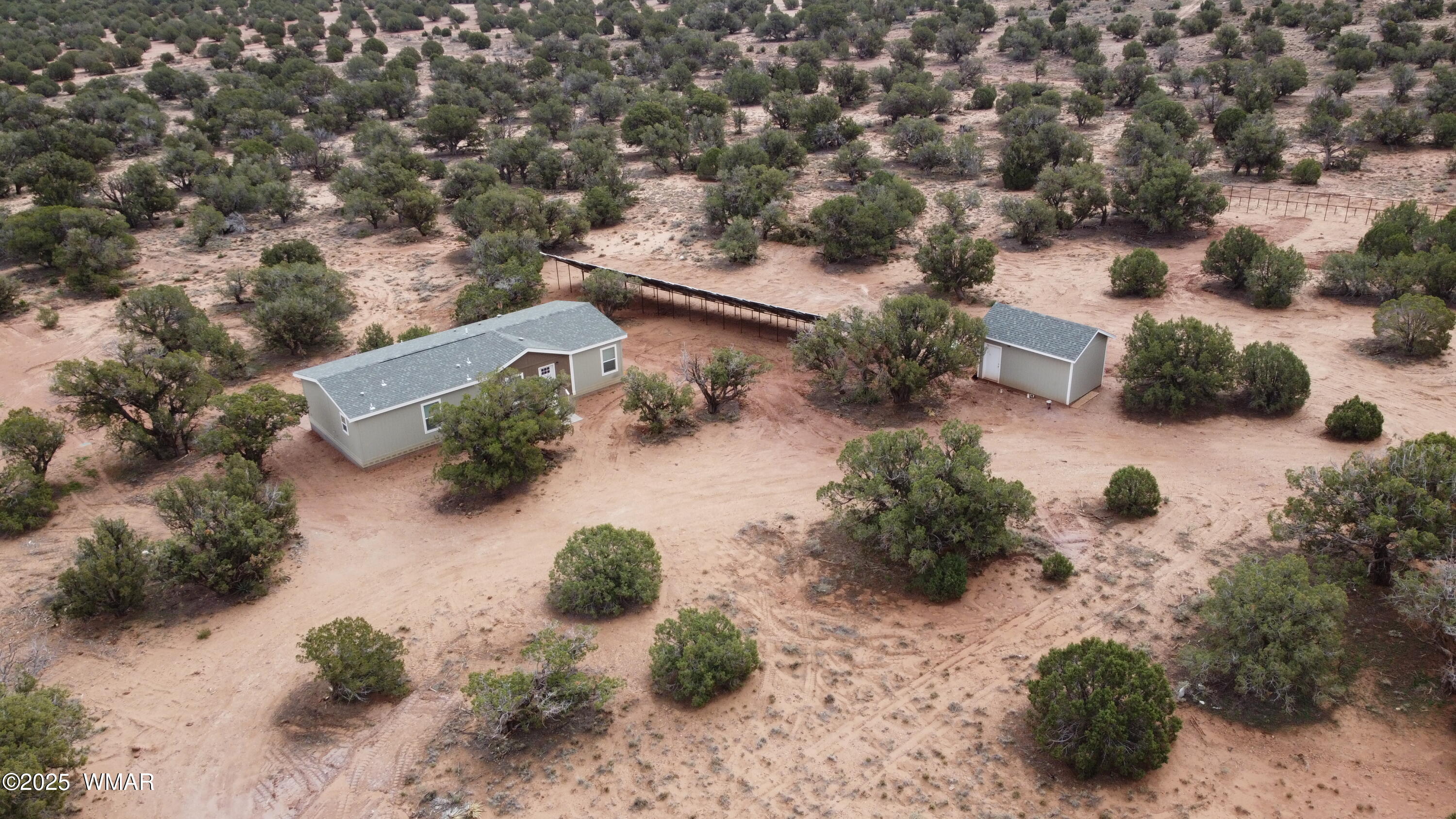 4129 Apache Road Snowflake, AZ 85937 - Photo 7 of 48 an aerial view of a house with a yard