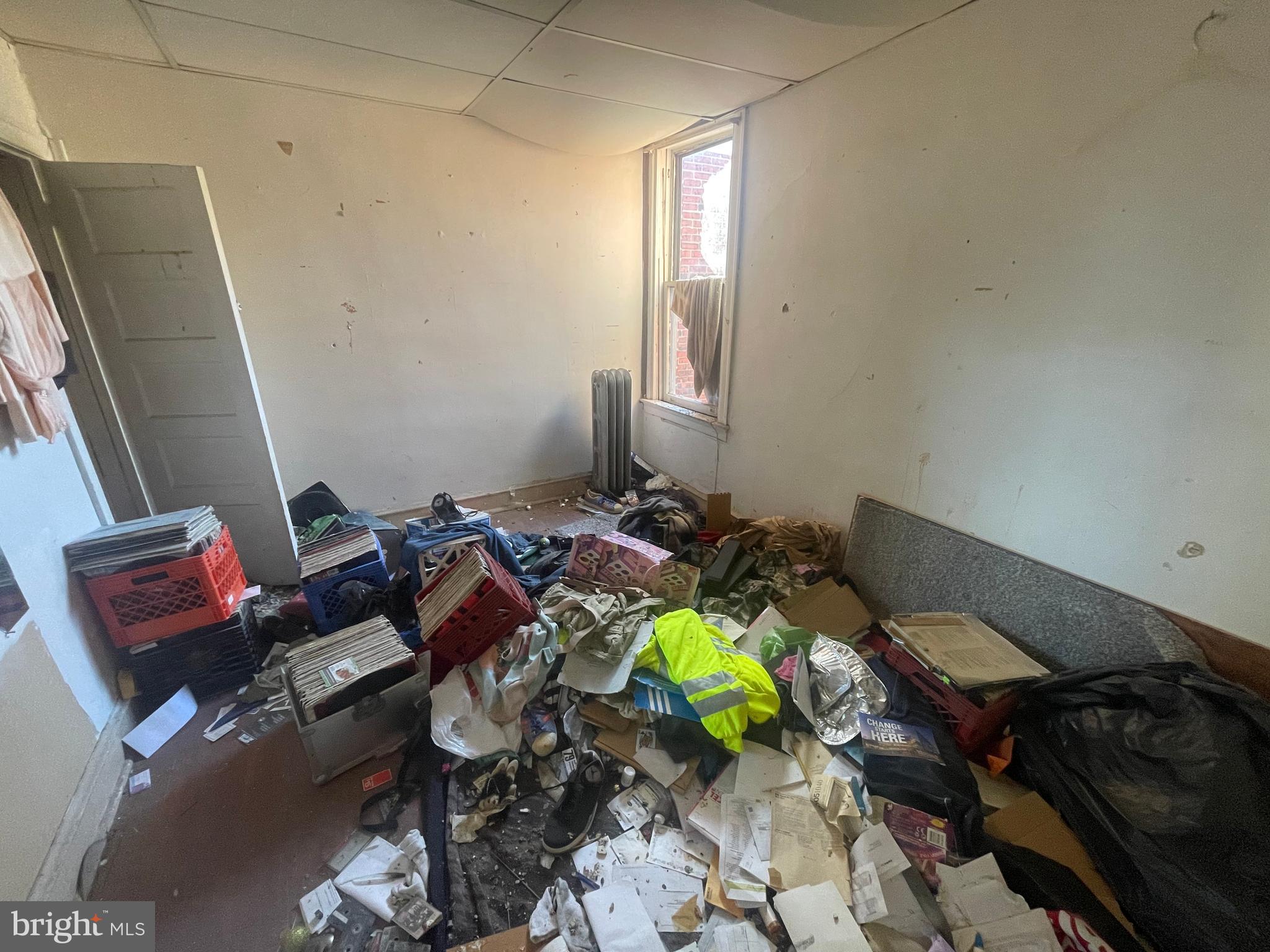 124 North 3rd Street Darby, PA 19023 - Photo 12 of 16 a living room with furniture and a rug