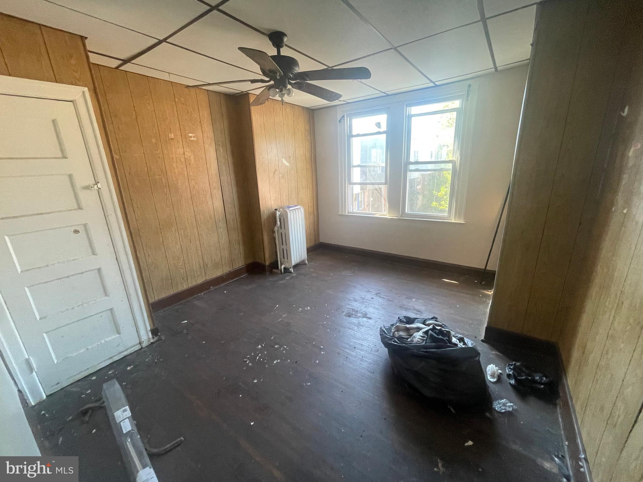 124 North 3rd Street Darby, PA 19023 - Photo 13 of 16 a view of livingroom with furniture and a window