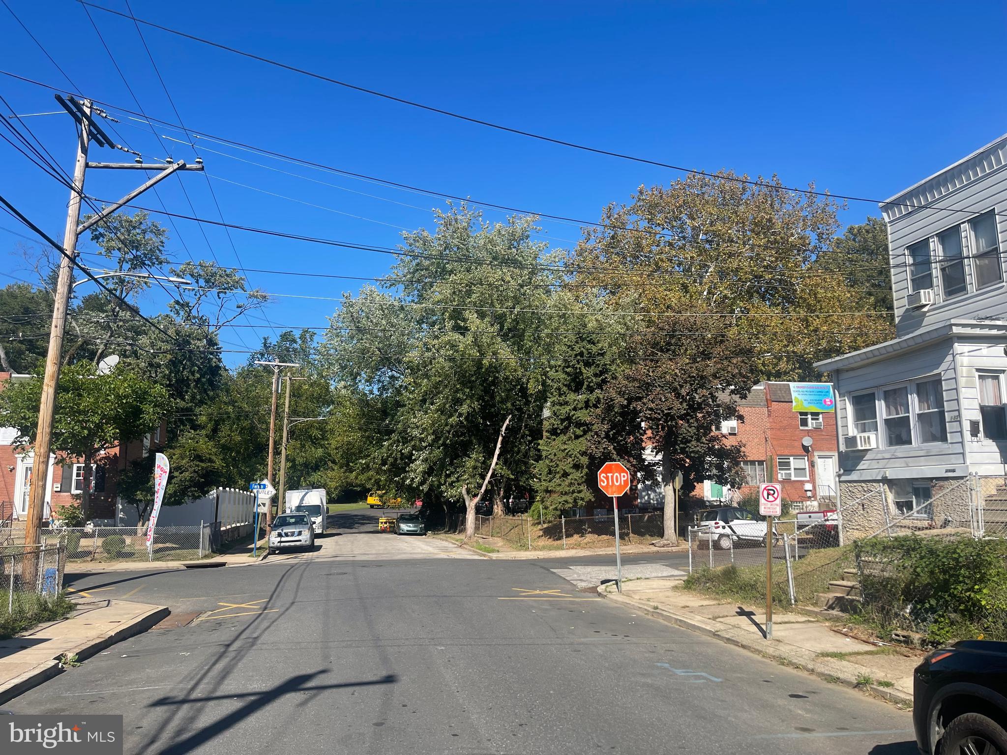 124 North 3rd Street Darby, PA 19023 - Photo 3 of 16 a view of a street with houses