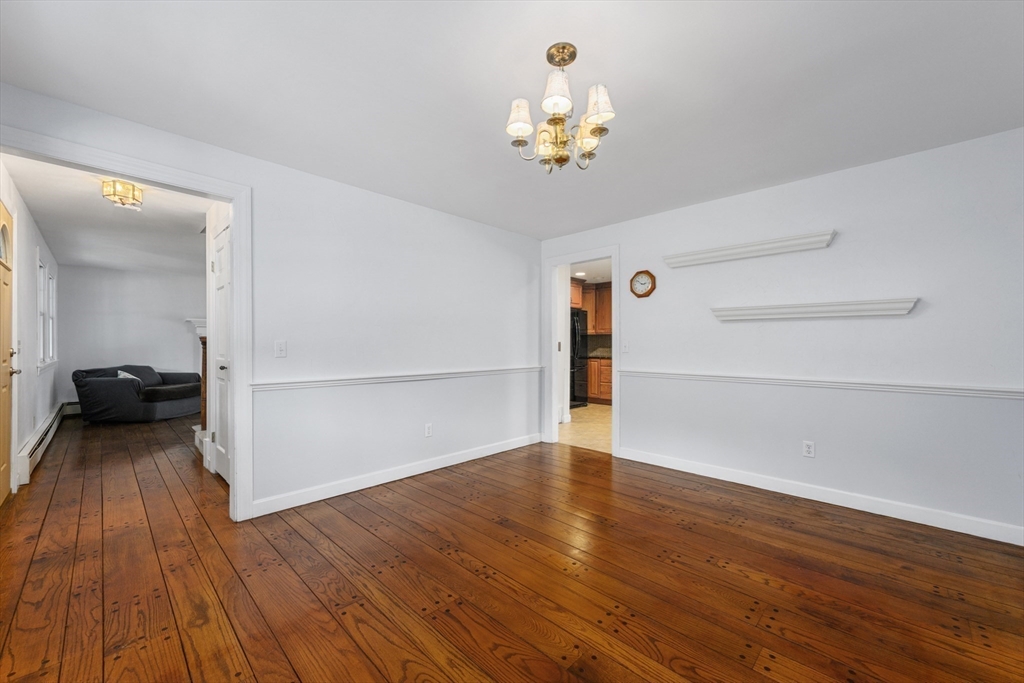 25 Robert Road Harwich, MA 02645 - Photo 12 of 36 a view of livingroom with furniture wooden floor chandelier