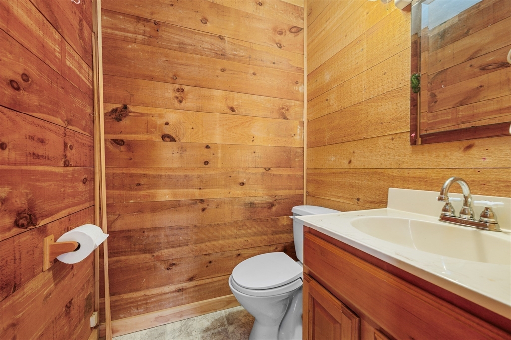 25 Robert Road Harwich, MA 02645 - Photo 18 of 36 a bathroom with a sink toilet and shower