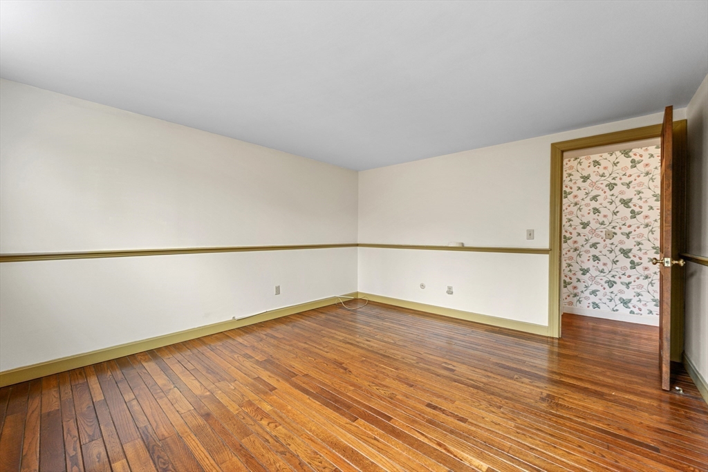 25 Robert Road Harwich, MA 02645 - Photo 24 of 36 a view of a big room with wooden floor