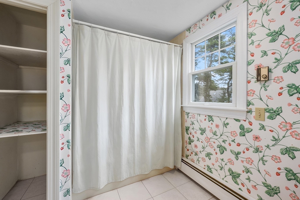 25 Robert Road Harwich, MA 02645 - Photo 27 of 36 a view of front door with wooden floor