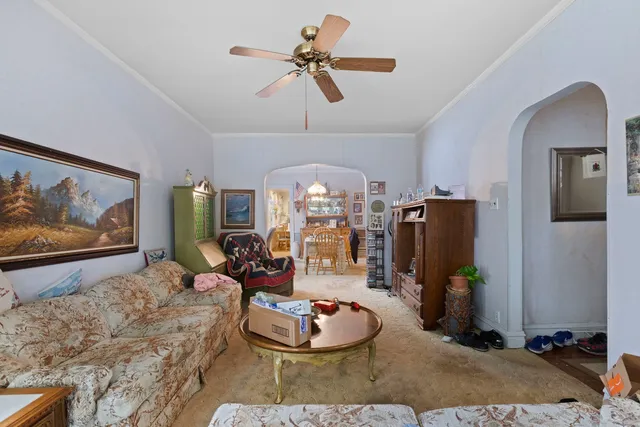 a room with furniture and a chandelier
