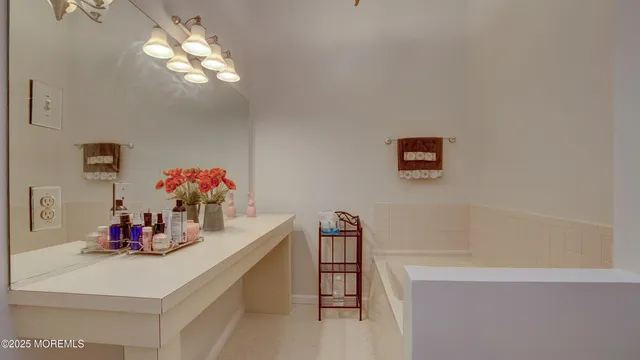 a view of dining room with furniture and chandelier
