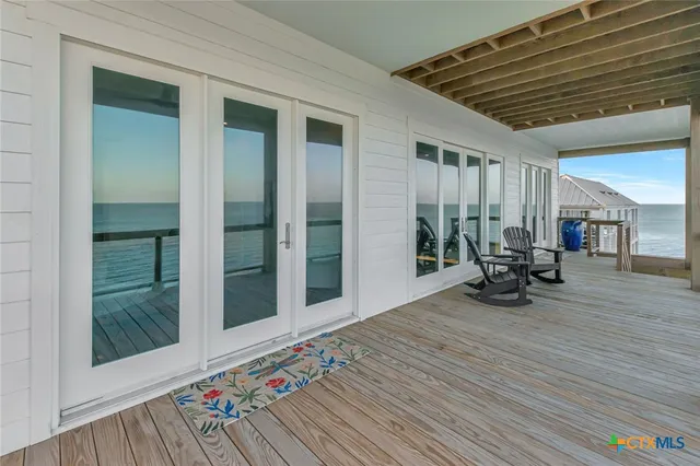 a view of swimming pool from a balcony