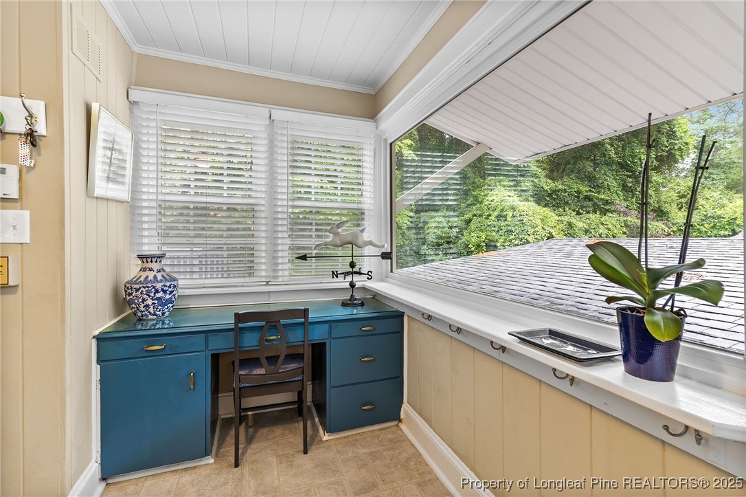 503 Rush Road Fayetteville, NC 28305 - Photo 21 of 50 a kitchen with a stove a sink and wooden cabinets