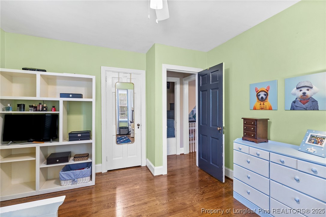 503 Rush Road Fayetteville, NC 28305 - Photo 38 of 50 a view of a workspace with furniture and wooden floor
