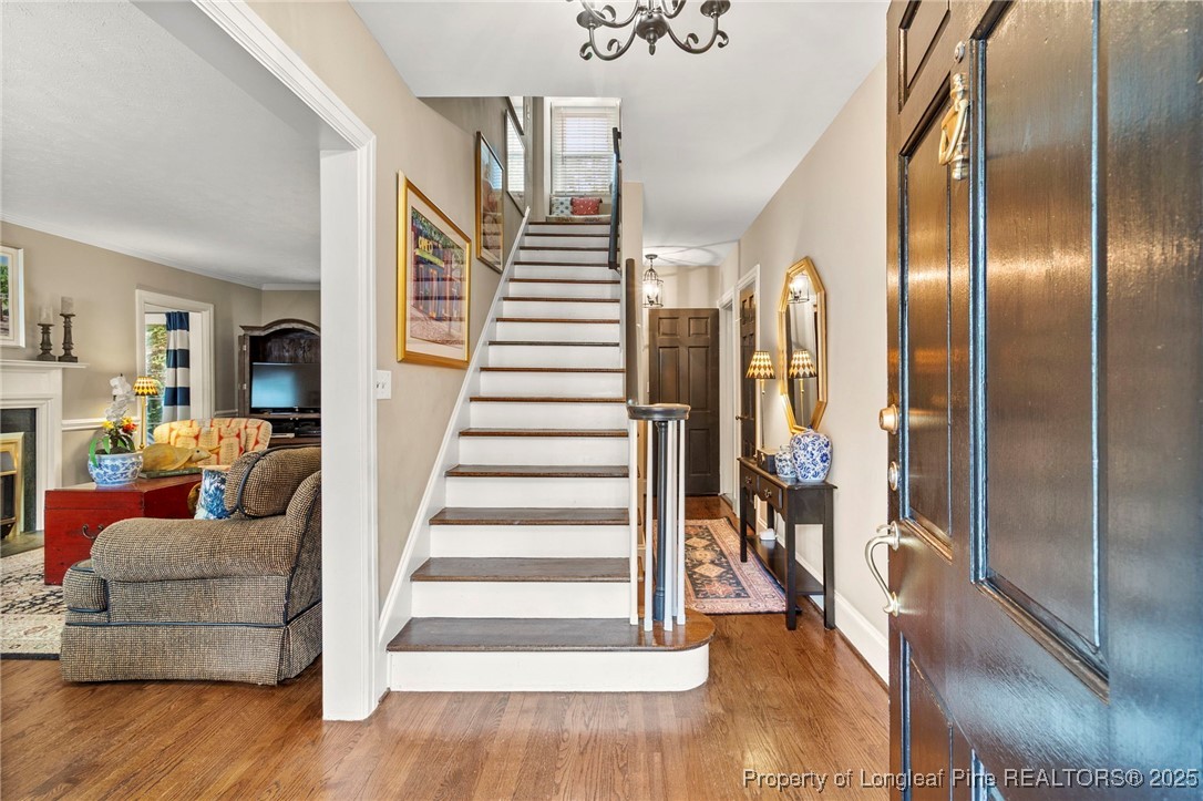 503 Rush Road Fayetteville, NC 28305 - Photo 7 of 50 a view of entryway and hall with wooden floor
