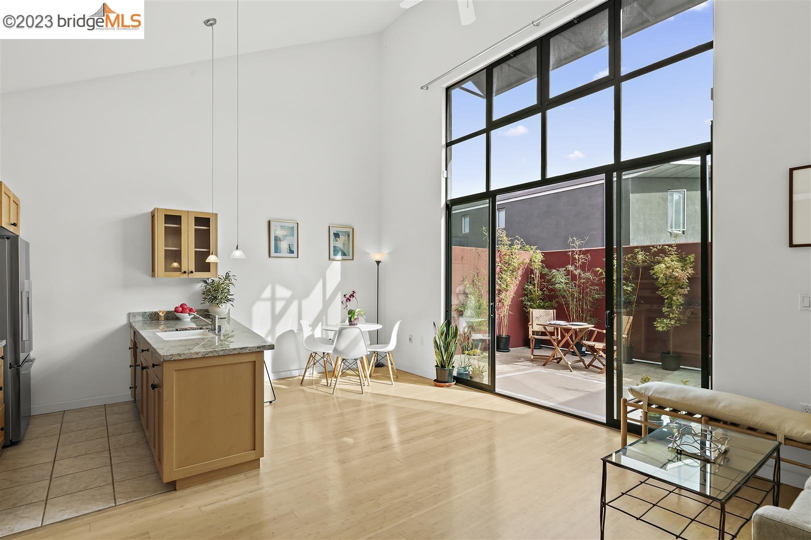 a room with gym equipment and view of living room