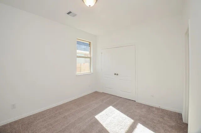 an empty room with a workbench