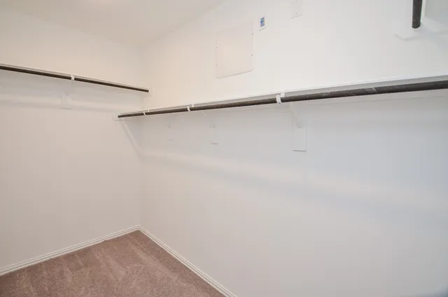 a view of small space with racks on the wall