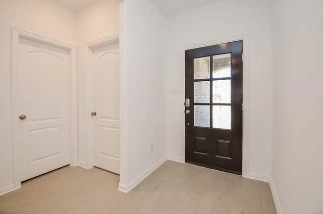 an empty room with windows