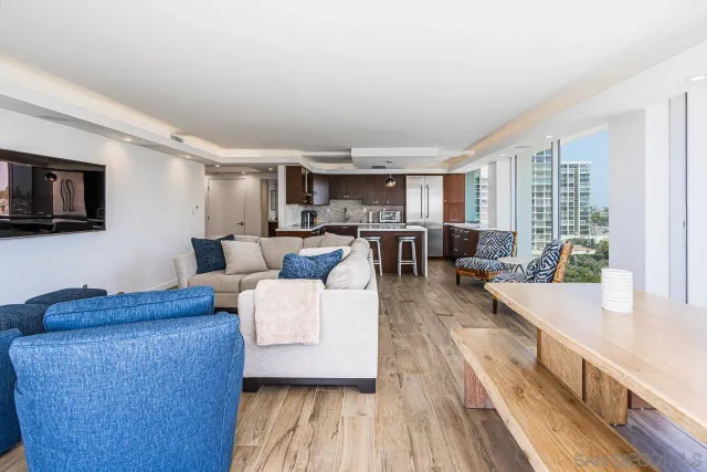 a kitchen with a sink stove and wooden cabinets