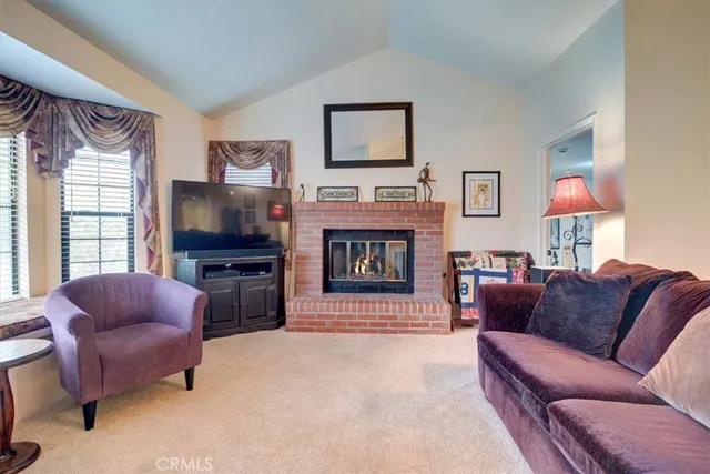 a project room with furniture and a chandelier
